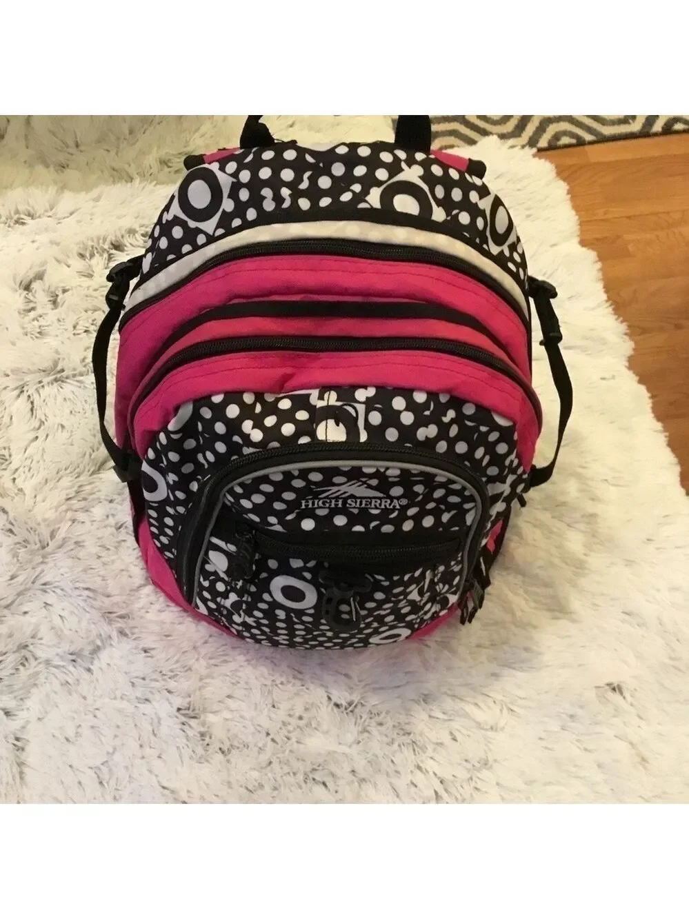High Sierra pink black and White patterned backpack with suspension stra…